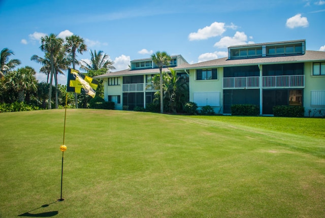 view of community with a yard