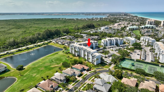 birds eye view of property featuring a water view