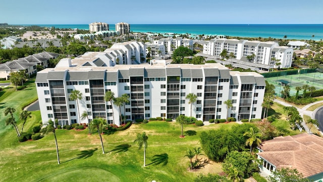 birds eye view of property featuring a water view