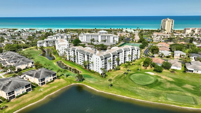 aerial view with view of golf course and a water view