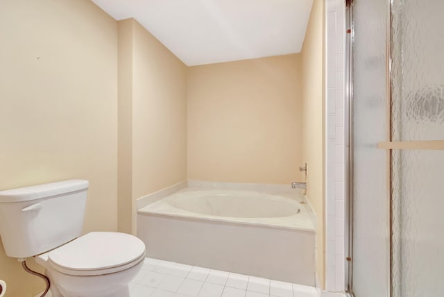 23 Westgate Ln Unit E, Boynton Beach, FL 33436 - bathroom with a shower stall, tile patterned flooring, a garden tub, and toilet