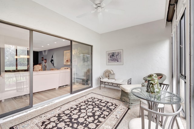 interior space featuring ceiling fan