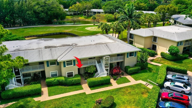 23 Westgate Ln Unit E, Boynton Beach, FL 33436 - aerial view with a water view and view of golf course