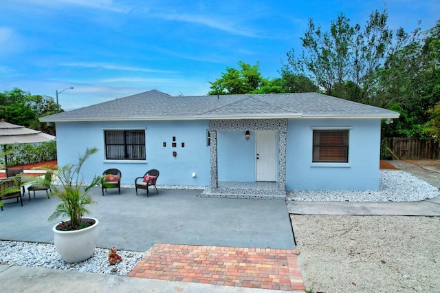 view of front of property with a patio area