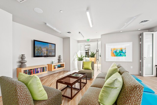 living room with light hardwood / wood-style floors