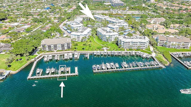 birds eye view of property featuring a water view