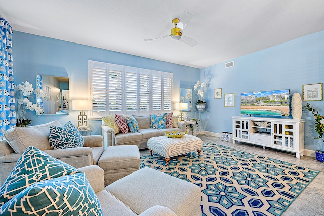 living room featuring ceiling fan