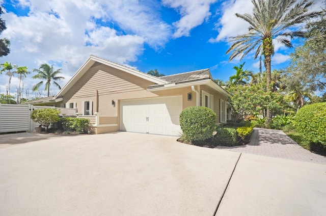 view of property exterior with a garage