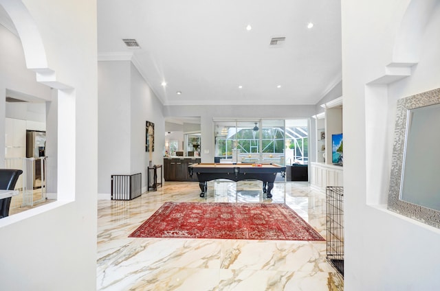 playroom featuring pool table, crown molding, and light tile flooring