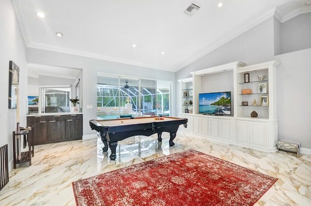 recreation room featuring light tile floors, pool table, crown molding, built in features, and vaulted ceiling