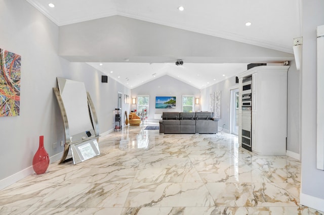 living room featuring ornamental molding, vaulted ceiling, and light tile floors