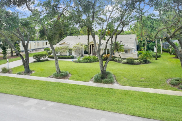 view of front of home featuring a front lawn