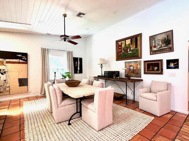 tiled dining area featuring wooden ceiling and ceiling fan