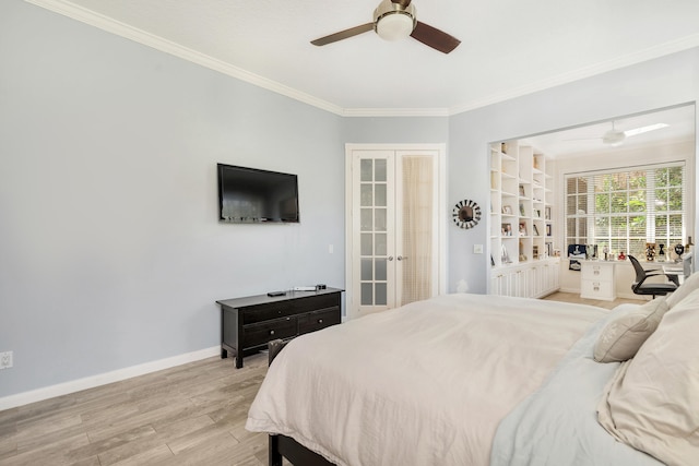 bedroom with ceiling fan, light hardwood / wood-style flooring, french doors, and crown molding