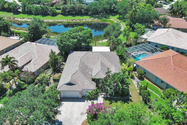 birds eye view of property featuring a water view