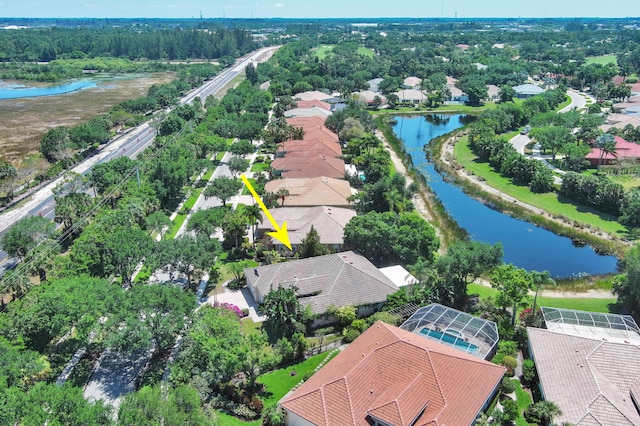 bird's eye view with a water view