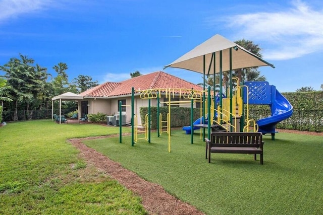 view of play area with a lawn and a gazebo