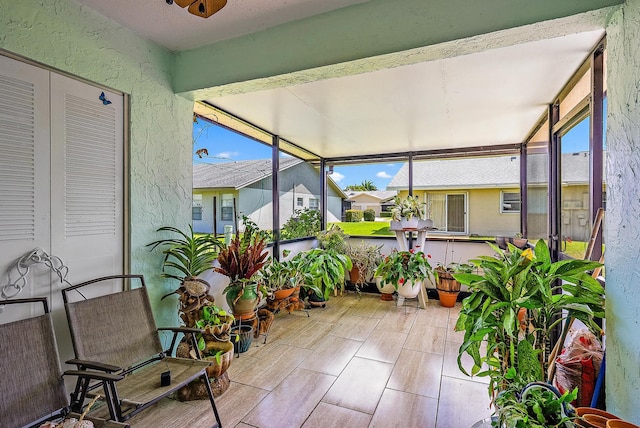 sunroom / solarium with a healthy amount of sunlight