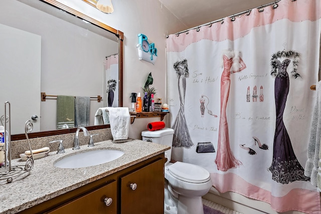 bathroom with oversized vanity and toilet