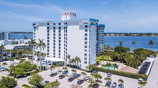 view of building exterior with a water view