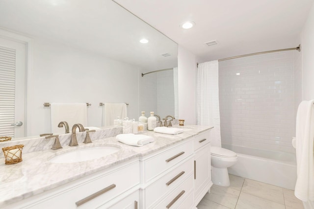 full bathroom with toilet, tile patterned flooring, shower / tub combo with curtain, and vanity