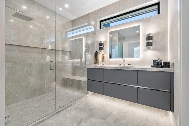 bathroom with vanity and an enclosed shower