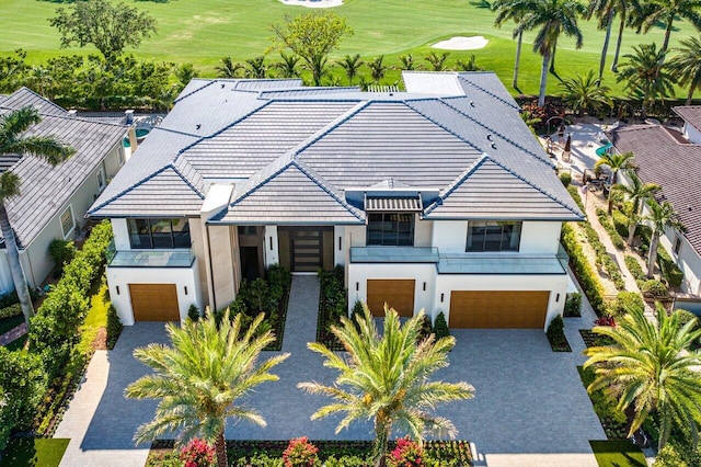 view of front of home with a balcony