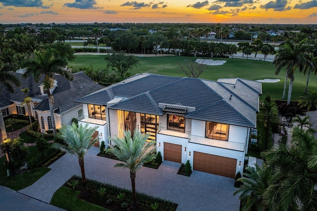 view of front of property featuring a balcony