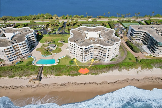 aerial view with a beach view and a water view