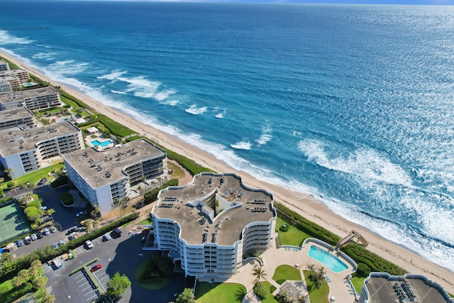 bird's eye view with a water view and a view of the beach