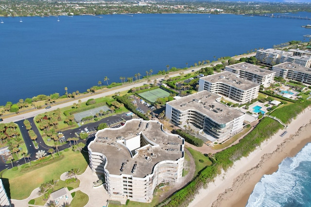 aerial view featuring a view of the beach and a water view