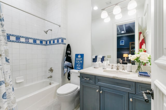 full bathroom featuring large vanity, crown molding, shower / bath combo, toilet, and tile floors