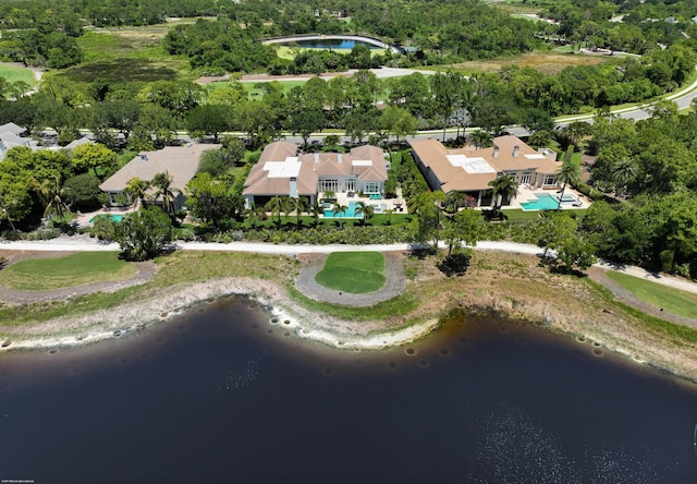 bird's eye view with a water view