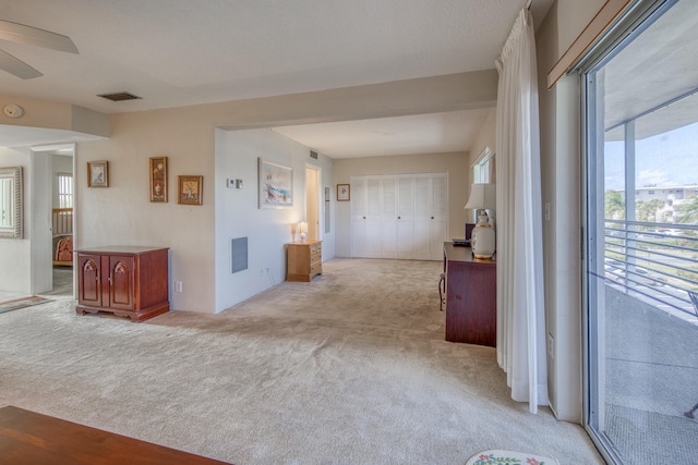 hallway featuring carpet flooring