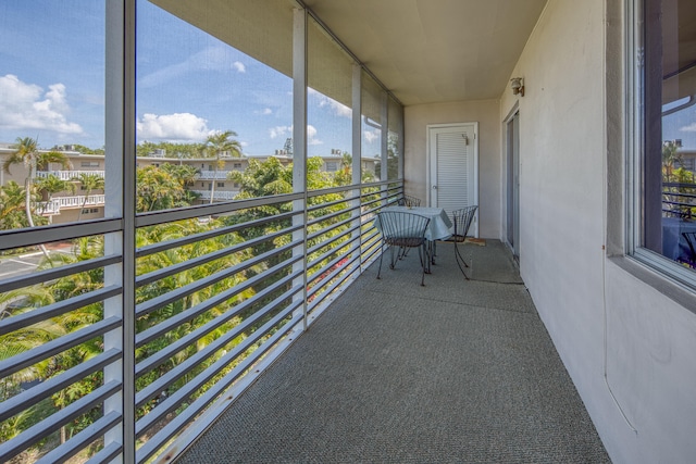 unfurnished sunroom with a healthy amount of sunlight