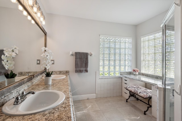 bathroom featuring dual bowl vanity and tile flooring