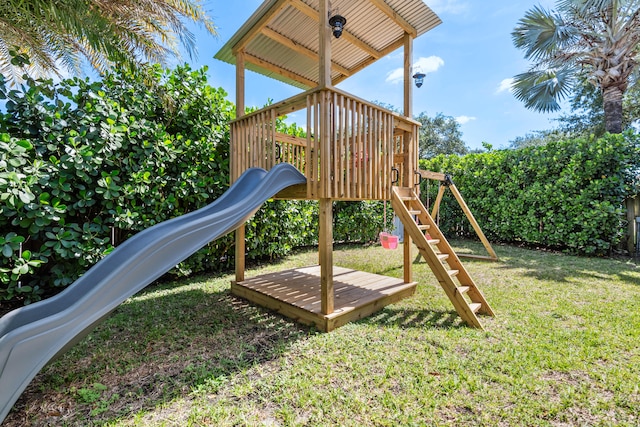 view of jungle gym with a lawn