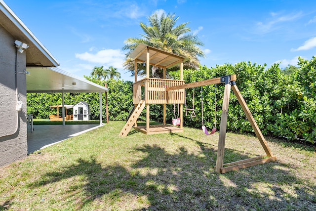 view of playground featuring a lawn and a gazebo