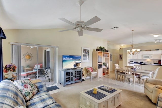 tiled living room featuring ceiling fan with notable chandelier and lofted ceiling