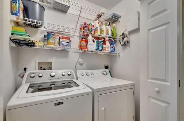 washroom with hookup for an electric dryer, washer and dryer, and hookup for a washing machine