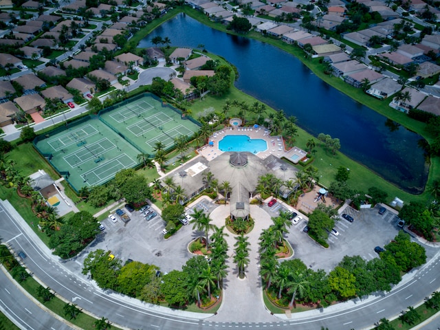 birds eye view of property featuring a water view