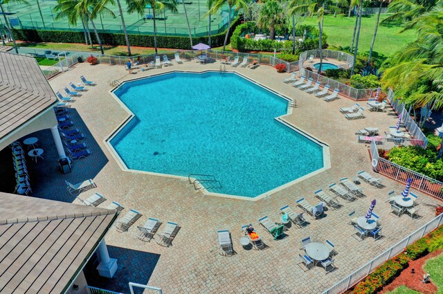 view of swimming pool featuring a patio area