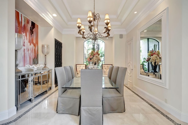 dining room featuring a healthy amount of sunlight, a raised ceiling, and light tile flooring