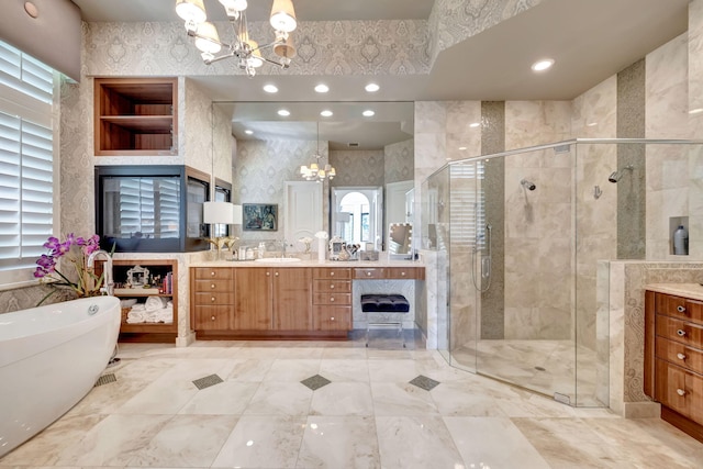 bathroom featuring vanity, an inviting chandelier, shower with separate bathtub, and tile flooring