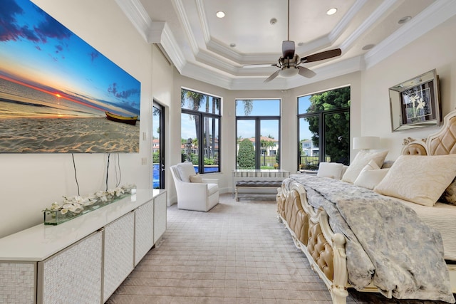 bedroom featuring ornamental molding, access to outside, ceiling fan, and a raised ceiling