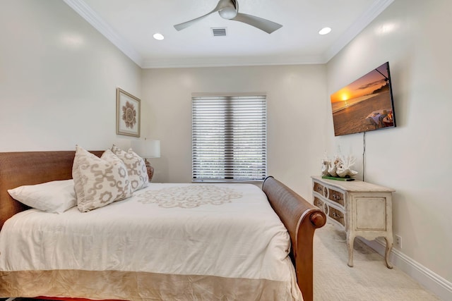 bedroom with ornamental molding, carpet, and ceiling fan