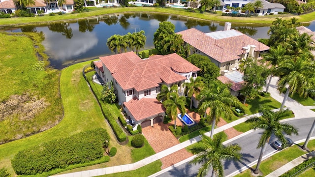 drone / aerial view with a water view