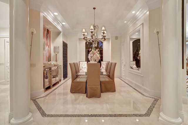 dining space featuring ornamental molding, a notable chandelier, ornate columns, and light tile floors