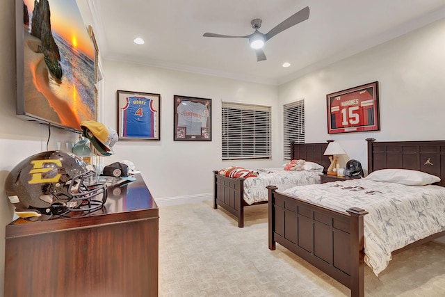 bedroom featuring light colored carpet, ceiling fan, and crown molding