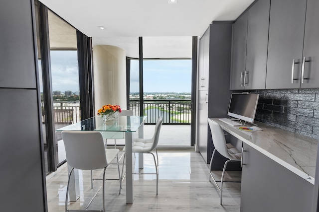 dining room with expansive windows